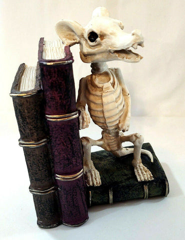 Skeleton Mouse On Books Statue